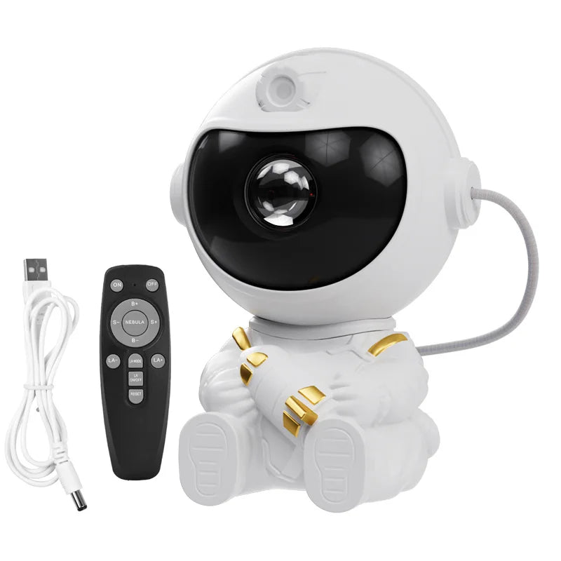 White robot toy with black face and gold accents, accompanied by a remote control and USB cable on a white background.