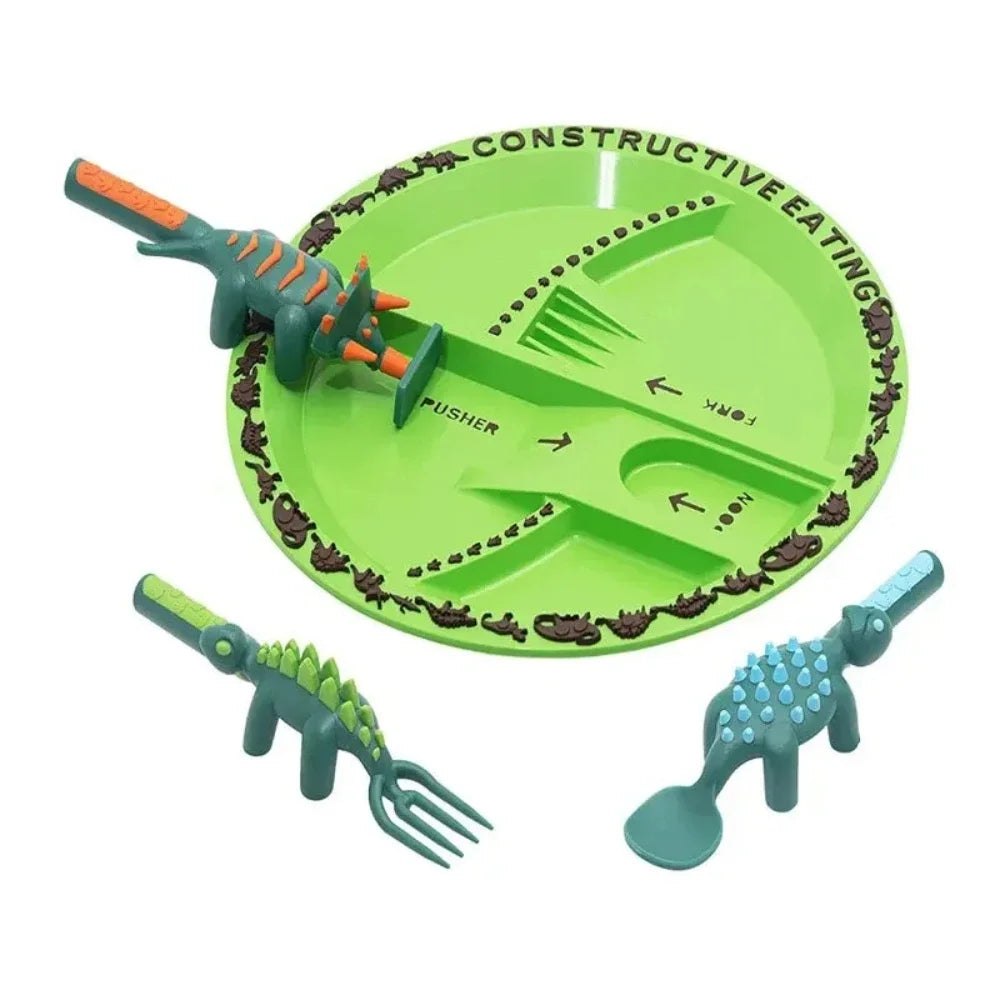Green plate with dinosaur-shaped utensils on a white background